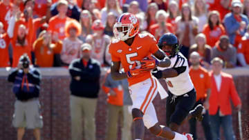 CLEMSON, SC - NOVEMBER 03: Malik Cunningham #3 of the Louisville Cardinals watches as Tee Higgins #5 of the Clemson Tigers catches a touchdown during their game at Clemson Memorial Stadium on November 3, 2018 in Clemson, South Carolina. (Photo by Streeter Lecka/Getty Images)