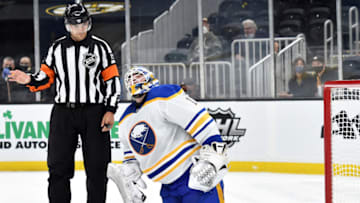 May 1, 2021; Boston, Massachusetts, USA; Buffalo Sabres goaltender Ukko-Pekka Luukkonen (1) appears to injure himself during the second period against the Boston Bruins at TD Garden. Mandatory Credit: Bob DeChiara-USA TODAY Sports