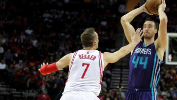 Jan 10, 2017; Houston, TX, USA; Charlotte Hornets forward Frank Kaminsky (44) handles the ball outside while Houston Rockets forward Sam Dekker (7) defends during the fourth quarter at Toyota Center. Mandatory Credit: Erik Williams-USA TODAY Sports