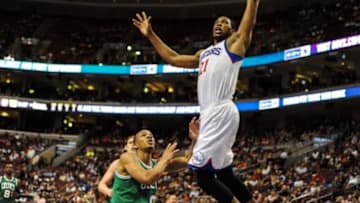 Apr 14, 2014; Philadelphia, PA, USA; Philadelphia 76ers forward Thaddeus Young (21) takes a shot during the third quarter of the game against the Boston Celtics at Wells Fargo Center. Mandatory Credit: John Geliebter-USA TODAY Sports