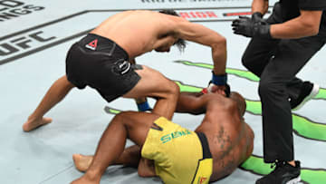 ATLANTA, GA - APRIL 13: (L-R) Alexandre Pantoja of Brazil punches Wilson Reis of Brazil in their flyweight bout during the UFC 236 event at State Farm Arena on April 13, 2019 in Atlanta, Georgia. (Photo by Josh Hedges/Zuffa LLC/Zuffa LLC via Getty Images)