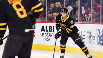 LAVAL, QC - OCTOBER 16: Providence Bruins defenceman Jakub Zboril (38) skates in control of the puck in the far end of his zone during the Providence Bruins versus the Laval Rocket game on October 16, 2019, at Place Bell in Laval, QC (Photo by David Kirouac/Icon Sportswire via Getty Images)