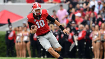 Oct 15, 2016; Athens, GA, USA; Georgia Bulldogs quarterback Jacob Eason (10) runs with the ball against the Vanderbilt Commodores during the second quarter at Sanford Stadium. Mandatory Credit: Dale Zanine-USA TODAY Sports