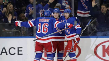 NEW YORK, NEW YORK - FEBRUARY 22: Jesper Fast #17 of the New York Rangers (C) celebrates his goal at 9:35 of the first period against the San Jose Sharks and is joined by Ryan Strome #16 (L) and Artemi Panarin #10 (R) at Madison Square Garden on February 22, 2020 in New York City. (Photo by Bruce Bennett/Getty Images)