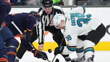 Face off between the Edmonton Oilers and San Jose Sharks. Mandatory Credit: Darren Yamashita-USA TODAY Sports