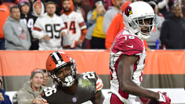 CLEVELAND, OHIO - OCTOBER 17: A.J. Green #18 of the Arizona Cardinals reacts after catching a touchdown pass while Greedy Williams #26 of the Cleveland Browns looks on during the fourth quarter at FirstEnergy Stadium on October 17, 2021 in Cleveland, Ohio. (Photo by Jason Miller/Getty Images)