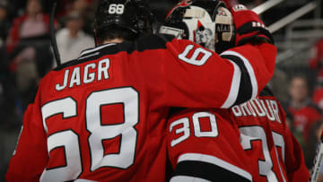 NEWARK, NJ - MARCH 04: Jaromir Jagr #68 embraces Martin Brodeur #30 of the New Jersey Devils foillowing a 4-3 victory over the Detroit Red Wings at the Prudential Center on March 4, 2014 in Newark, New Jersey. (Photo by Bruce Bennett/Getty Images)