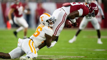 Tennessee defensive back Theo Jackson (26) tackles Alabama tight end Jahleel Billingsley (19) during a football game between the Tennessee Volunteers and the Alabama Crimson Tide at Bryant-Denny Stadium in Tuscaloosa, Ala., on Saturday, Oct. 23, 2021.Kns Tennessee Alabama Football Bp