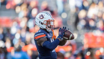 Auburn football wide receiver Shedrick Jackson (11) warms up before Auburn Tigers take on Alabama Crimson Tide at Jordan-Hare Stadium in Auburn, Ala., on Saturday, Nov. 27, 2021.