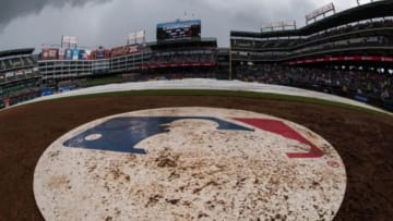 Jun 13, 2015; Arlington, TX, USA; A view of the MLB logo during a rain delay in the game between the Texas Rangers and the Minnesota Twins at Globe Life Park in Arlington. Mandatory Credit: Jerome Miron-USA TODAY Sports