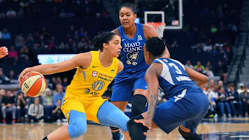 MINNEAPOLIS, MINNESOTA - MAY 25: Gabby Williams #15 of the Chicago Sky dribbles against Danielle Robinson #3 and Damiris Dantas #92 of the Minnesota Lynx during their game at Target Center on May 25, 2019 in Minneapolis, Minnesota. NOTE TO USER: User expressly acknowledges and agrees that, by downloading and or using this photograph, User is consenting to the terms and conditions of the Getty Images License Agreement. (Photo by Sam Wasson/Getty Images)