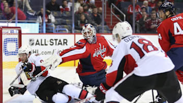 Jan 1, 2017; Washington, DC, USA; Washington Capitals goalie Braden Holtby (70) makes a save in front of Ottawa Senators right wing Bobby Ryan (9) during the second period at Verizon Center. Mandatory Credit: Amber Searls-USA TODAY Sports