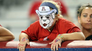 TUCSON, AZ - SEPTEMBER 19: A young Arizona Wildcats fan watches the fourth quarter of the college football game against the Northern Arizona Lumberjacks at Arizona Stadium on September 19, 2015 in Tucson, Arizona. (Photo by Chris Coduto/Getty Images)
