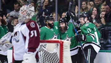 Dec 29, 2016; Dallas, TX, USA; Dallas Stars defenseman Johnny Oduya (47) and right wing Patrick Eaves (18) and center Devin Shore (17) celebrate a goal by Shore against Colorado Avalanche goalie Calvin Pickard (31) during the first quarter at the American Airlines Center. Mandatory Credit: Jerome Miron-USA TODAY Sports
