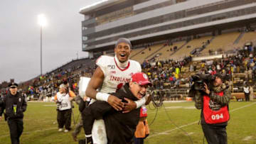 Indiana head coach Tom Allen carries Indiana wide receiver Whop Philyor (1) across the field after defeating Purdue, 44-41 in double overtime to win the Old Oaken Bucket, Saturday, Nov. 30, 2019 at Ross-Ade Stadium in West Lafayette.Cfb Purdue Vs Indiana