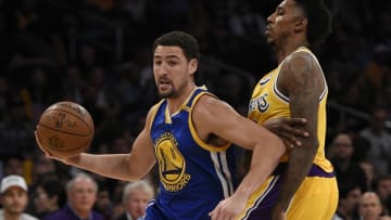 Nov 4, 2016; Los Angeles, CA, USA; Golden State Warriors guard Klay Thompson (11) drives the ball defended by Los Angeles Lakers guard Nick Young (0) during the first quarter at Staples Center. Mandatory Credit: Kelvin Kuo-USA TODAY Sports