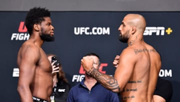 LAS VEGAS, NEVADA - JUNE 25: In this UFC handout, (L-R) Opponents Kennedy Nzechukwu of Nigeria and Danilo Marques of Brazil face off during the UFC weigh-in at UFC APEX on June 25, 2021 in Las Vegas, Nevada. (Photo by Chris Unger/Zuffa LLC/Getty Images)