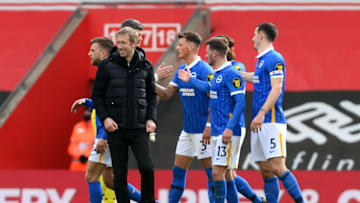 SOUTHAMPTON, ENGLAND - MARCH 14: Graham Potter, Manager of Brighton and Hove Albion interacts with (L - R) Ben White, Pascal Gross and Lewis Dunk of Brighton & Hove Albion following the Premier League match between Southampton and Brighton & Hove Albion at St Mary's Stadium on March 14, 2021 in Southampton, England. Sporting stadiums around the UK remain under strict restrictions due to the Coronavirus Pandemic as Government social distancing laws prohibit fans inside venues resulting in games being played behind closed doors. (Photo by Mike Hewitt/Getty Images)