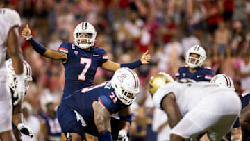 Oct 1, 2022; Tucson, Arizona, USA; Arizona Wildcats quarterback Jayden de Laura (7) calls an audible in the second half against the Colorado Buffaloes at Arizona Stadium. Mandatory Credit: Ivan Pierre Aguirre-USA TODAY Sports