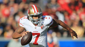 LOS ANGELES, CA - DECEMBER 24: Colin Kaepernick #7 of the San Francisco 49ers runs with the ball during the game against the Los Angeles Rams at Los Angeles Memorial Coliseum on December 24, 2016 in Los Angeles, California. (Photo by Sean M. Haffey/Getty Images)