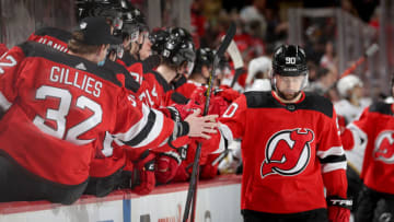 Tomas Tatar #90 of the New Jersey Devils celebrates his goal with teammates on the bench during the third period against the Vegas Golden Knights at Prudential Center on December 16, 2021 in Newark, New Jersey. The Vegas Golden Knights defeated the New Jersey Devils 5-3. (Photo by Elsa/Getty Images)