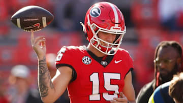 Georgia quarterback Carson Beck (15) warms up before the start of a game against Missouri.