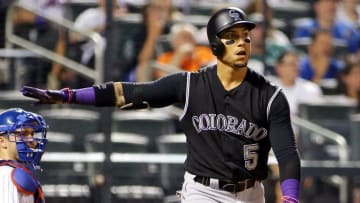 Jul 29, 2016; New York City, NY, USA; Colorado Rockies right fielder Carlos Gonzalez (5) reacts after hitting a three run home run against the New York Mets during the ninth inning at Citi Field. The Rockies won 6-1. Mandatory Credit: Andy Marlin-USA TODAY Sports