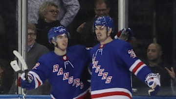 NEW YORK, NEW YORK - NOVEMBER 26: Chris Kreider #20 of the New York Rangers (r) scores the game winning goal at 8:18 of the third period against the Ottawa Senators and is joined by Filip Chytil #72 (l) at Madison Square Garden on November 26, 2018 in New York City. The Rangers defeated the Senators 4-2. (Photo by Bruce Bennett/Getty Images)