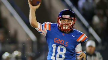 Sep 26, 2014; Las Vegas, NV, USA; Bishop Gorman Gaels quarterback Tate Martell (18) looks to pass the ball during a game against St. John Bosco High School at Fertitta Field. Bishop Gorman won the game 34-31. Mandatory Credit: Stephen R. Sylvanie-USA TODAY Sports