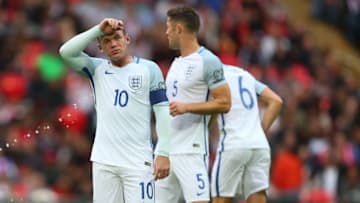 LONDON, ENGLAND - OCTOBER 08: Wayne Rooney of England wipes his brow during the FIFA 2018 World Cup Qualifier between England and Malta at Wembley Stadium on October 8, 2016 in London, England. (Photo by Catherine Ivill - AMA/Getty Images)