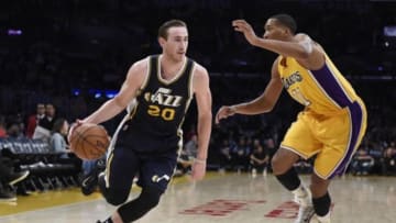 Mar 19, 2015; Los Angeles, CA, USA; Utah Jazz forward Gordon Hayward (20) drives to the basket against Los Angeles Lakers forward Wesley Johnson (11) during the game at Staples Center. Mandatory Credit: Richard Mackson-USA TODAY Sports