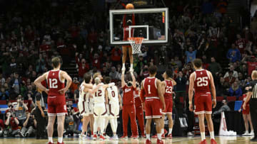 Mar 17, 2022; Portland, OR, USA; Indiana Hoosiers cheerleaders retrieve the basketball against the Saint Mary's Gaels during the second half during the first round of the 2022 NCAA Tournament at Moda Center. Mandatory Credit: Troy Wayrynen-USA TODAY Sports