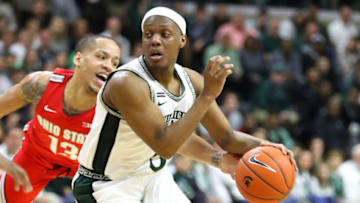 EAST LANSING, MICHIGAN - MARCH 08: Cassius Winston #5 of the Michigan State Spartans drives past CJ Walker #13 of the Ohio State Buckeyes during the first half at the Breslin Center on March 08, 2020 in East Lansing, Michigan. (Photo by Gregory Shamus/Getty Images)