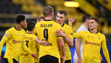 Thomas Meunier and Erling Haaland of Borussia Dortmund celebrate after the UEFA Champions League Group F stage match between Borussia Dortmund and Zenit St. Petersburg (Photo by Lukas Schulze/Getty Images)