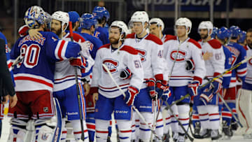 NEW YORK, NY - MAY 29: Henrik Lundqvist #30 of the New York Rangers hugs Brandon Prust #8 of the Montreal Canadiens after defeating the Montreal Canadiens in Game Six to win the Eastern Conference Final in the 2014 NHL Stanley Cup Playoffs at Madison Square Garden on May 29, 2014 in New York City. The New York Rangers defeated the Montreal Canadiens 1 to 0. (Photo by Mike Stobe/Getty Images)