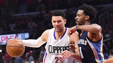 Jan 4, 2017; Los Angeles, CA, USA; Memphis Grizzlies guard Mike Conley (11) defends Los Angeles Clippers guard Austin Rivers (25) in the second half at Staples Center. The Clippers won 115-106. Mandatory Credit: Jayne Kamin-Oncea-USA TODAY Sports