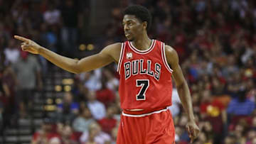 Mar 31, 2016; Houston, TX, USA; Chicago Bulls guard Justin Holiday (7) reacts after scoring during the fourth quarter against the Houston Rockets at Toyota Center. Mandatory Credit: Troy Taormina-USA TODAY Sports