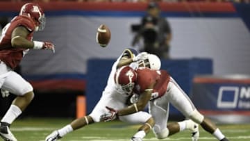 Aug 30, 2014; Atlanta, GA, USA; West Virginia Mountaineers wide receiver Jordan Thompson (10) is hit by Alabama Crimson Tide defensive back Landon Collins (26) as he tries to catch a pass in the fourth quarter of the 2014 Chick-fil-A Kickoff Game at the Georgia Dome. Mandatory Credit: RVR Photos-USA TODAY Sports