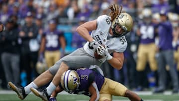 SEATTLE, WA - OCTOBER 20: Defensive back Myles Bryant #5 of the Washington Huskies tackles Brady Russell #38 of the Colorado Buffaloes at Husky Stadium on October 20, 2018 in Seattle, Washington. (Photo by Otto Greule Jr/Getty Images)
