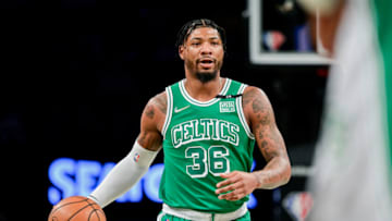 NEW YORK, NEW YORK - FEBRUARY 08: Marcus Smart #36 of the Boston Celtics handles the ball against the Brooklyn Nets at Barclays Center on February 08, 2022 in New York City. NOTE TO USER: User expressly acknowledges and agrees that, by downloading and or using this photograph, User is consenting to the terms and conditions of the Getty Images License Agreement. (Photo by Steven Ryan/Getty Images)