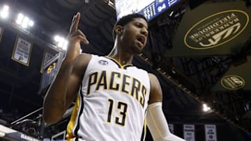 Mar 7, 2016; Indianapolis, IN, USA; Indiana Pacers forward Paul George (13) reacts to making a basket and getting fouled with 15 seconds to go in the game against the San Antonio Spurs at Bankers Life Fieldhouse. Indiana defeats San Antonio 99-91. Mandatory Credit: Brian Spurlock-USA TODAY Sports
