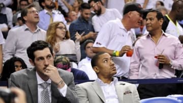May 15, 2013; Miami, FL, USA; Chicago Bulls shooting guard Kirk Hinrich (left) sits next to teammate point guard Derrick Rose (right) during the second half against the Miami Heat in game five of the second round of the 2013 NBA Playoffs at American Airlines Arena. Miami Heat won 94-91. Mandatory Credit: Steve Mitchell-USA TODAY Sports
