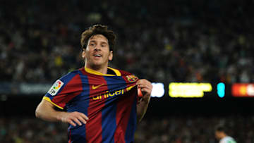 Lionel Messi of Barcelona holds his shirt. (Photo by Jasper Juinen/Getty Images)