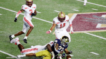 CHESTNUT HILL, MASSACHUSETTS - NOVEMBER 14: Kyren Williams #23 of the Notre Dame Fighting Irish fumbled the ball during the second quarter against the Boston College Eagles at Alumni Stadium on November 14, 2020 in Chestnut Hill, Massachusetts. (Photo by Maddie Meyer/Getty Images)