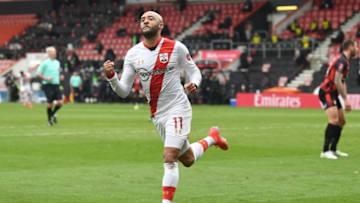 Southampton's English midfielder Nathan Redmond celebrates scoring his team's second goal during the English FA Cup quarter final football match between Bournemouth and Southampton at the Vitality Stadium in Bournemouth, southern England on March 20, 2021. - RESTRICTED TO EDITORIAL USE. No use with unauthorized audio, video, data, fixture lists, club/league logos or 'live' services. Online in-match use limited to 120 images. An additional 40 images may be used in extra time. No video emulation. Social media in-match use limited to 120 images. An additional 40 images may be used in extra time. No use in betting publications, games or single club/league/player publications. (Photo by Glyn KIRK / AFP) / RESTRICTED TO EDITORIAL USE. No use with unauthorized audio, video, data, fixture lists, club/league logos or 'live' services. Online in-match use limited to 120 images. An additional 40 images may be used in extra time. No video emulation. Social media in-match use limited to 120 images. An additional 40 images may be used in extra time. No use in betting publications, games or single club/league/player publications. / RESTRICTED TO EDITORIAL USE. No use with unauthorized audio, video, data, fixture lists, club/league logos or 'live' services. Online in-match use limited to 120 images. An additional 40 images may be used in extra time. No video emulation. Social media in-match use limited to 120 images. An additional 40 images may be used in extra time. No use in betting publications, games or single club/league/player publications. (Photo by GLYN KIRK/AFP via Getty Images)