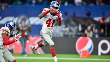 Oct 23, 2016; London, ENG; Cornerback Dominique Rodgers-Cromartie (41) of the New York Giants intercepts a 4 yard pass from quarterback Case Keenum (17) of the Los Angeles Rams during the fourth quarter of the game between the Los Angeles Rams and the New York Giants at Twickenham Stadium. Mandatory Credit: Steve Flynn-USA TODAY Sports