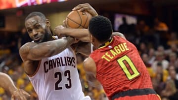 May 4, 2016; Cleveland, OH, USA; Cleveland Cavaliers forward LeBron James (23) is fouled by Atlanta Hawks guard Jeff Teague (0) during the second quarter in game two of the second round of the NBA Playoffs at Quicken Loans Arena. Mandatory Credit: Ken Blaze-USA TODAY Sports