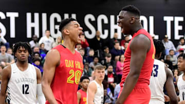 MIDDLE VILLAGE, NEW YORK - APRIL 05: Dylan Cardwell #20 and Kofi Cockburn #21 of Oak Hill Academy celebrate against La Lumiere in the semifinal of the GEICO High School National Tournament at Christ the King High School on April 05, 2019 in Middle Village, New York. (Photo by Steven Ryan/Getty Images)