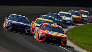 INDIANAPOLIS, IN - JULY 23: Matt Kenseth, driver of the #20 Tide Pods Toyota, leads a pack of cars during the Monster Energy NASCAR Cup Series Brickyard 400 at Indianapolis Motorspeedway on July 23, 2017 in Indianapolis, Indiana. (Photo by Sean Gardner/Getty Images)