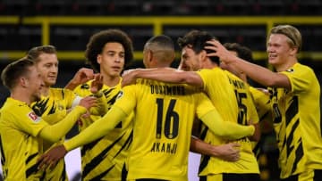 Borussia Dortmund players celebrate a goal (Photo by INA FASSBENDER/AFP via Getty Images)
